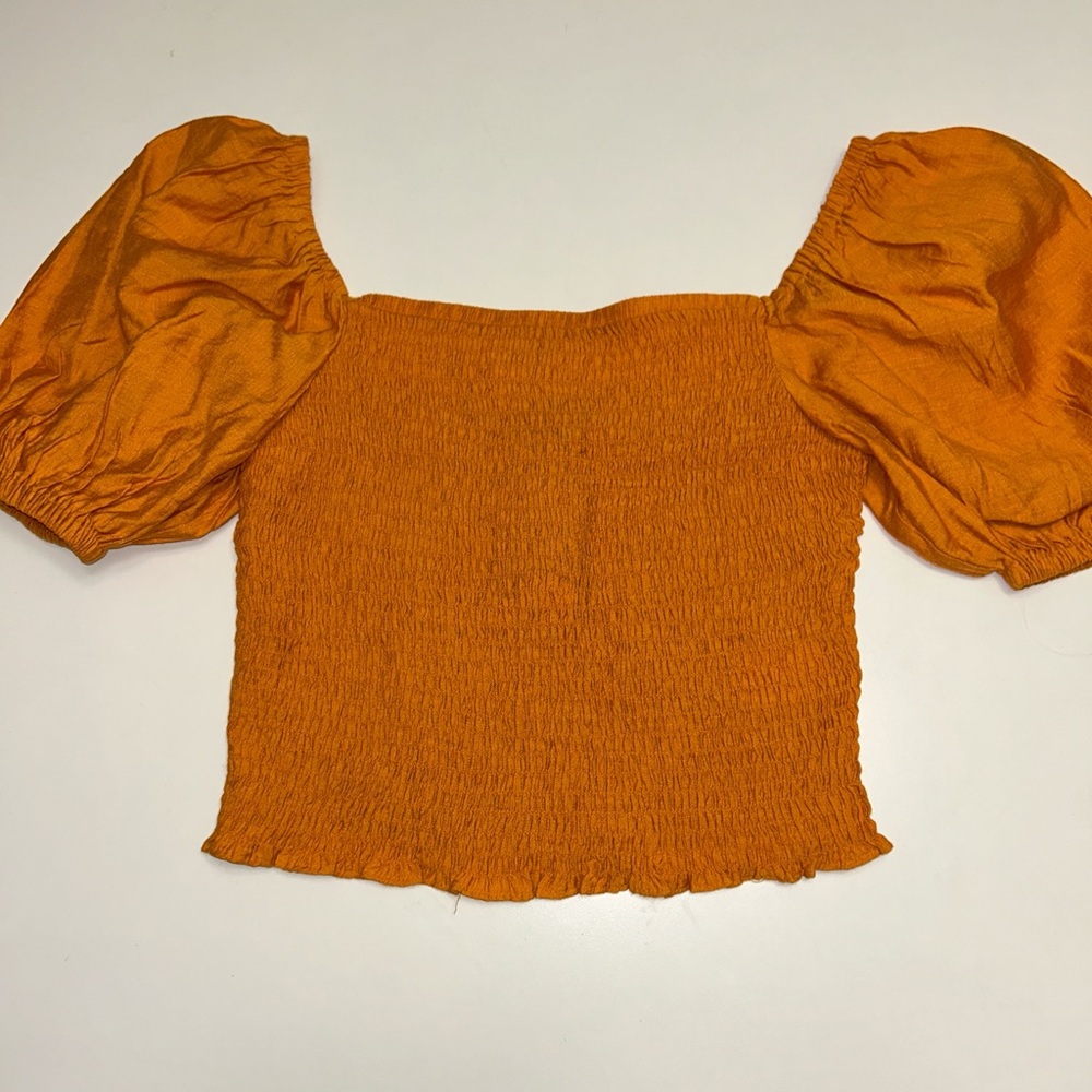Express women’s burnt orange stretch top with puff sleeves size small NWT